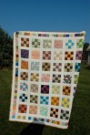 Nine Patch quilt by Sewfrench