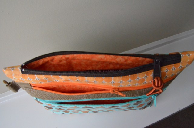Triple zipper pouch